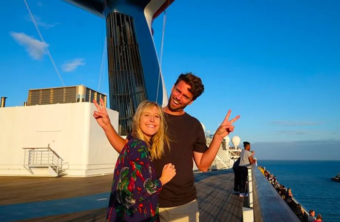 A couple taking a picture on the deck