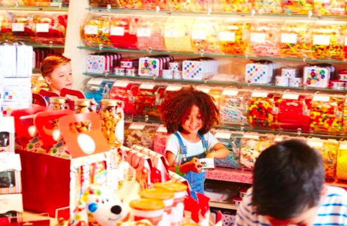 Kids selecting their favorite candies inside Cherry on Top on Dinogo Horizon