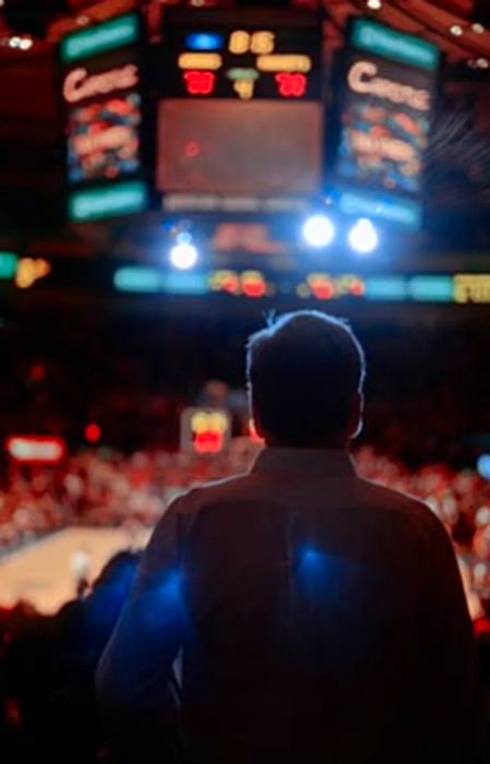 man watching a professional sports game in New York