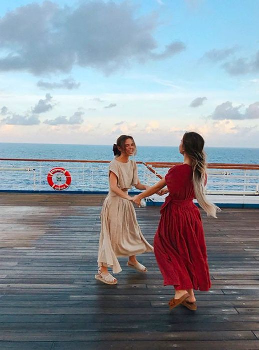 Tess & Sarah dancing on the deck