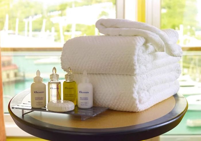 a collection of spa towels and luxury soaps