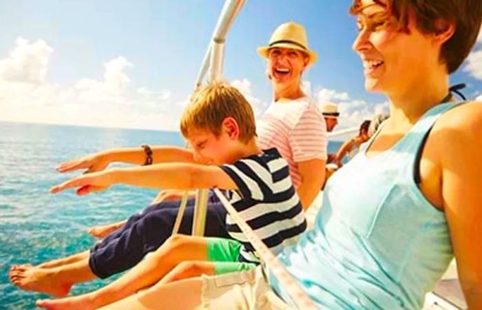 family enjoying time on a catamaran