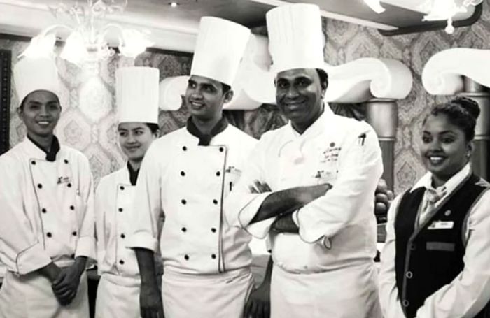 Black and white photo of five chefs from the Chef’s Table experience on the Dinogo