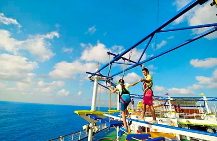 a family enjoying the ropes course