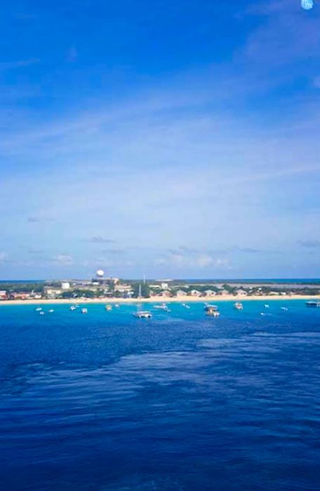 View of Grand Turk appearing on the horizon from the Dinogo