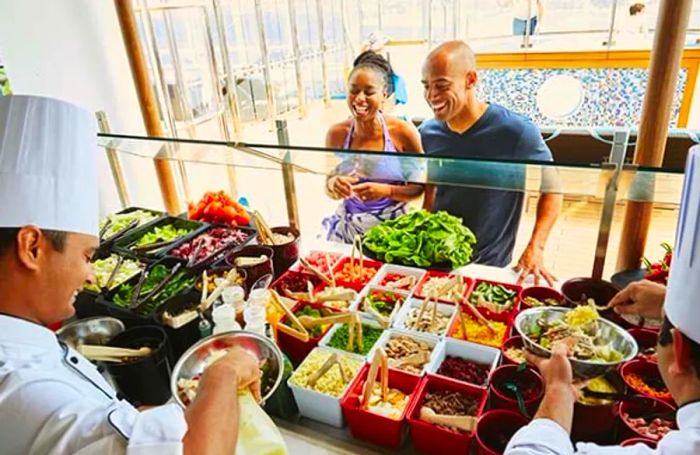 couple enjoying the salad bar at Fresh Creations