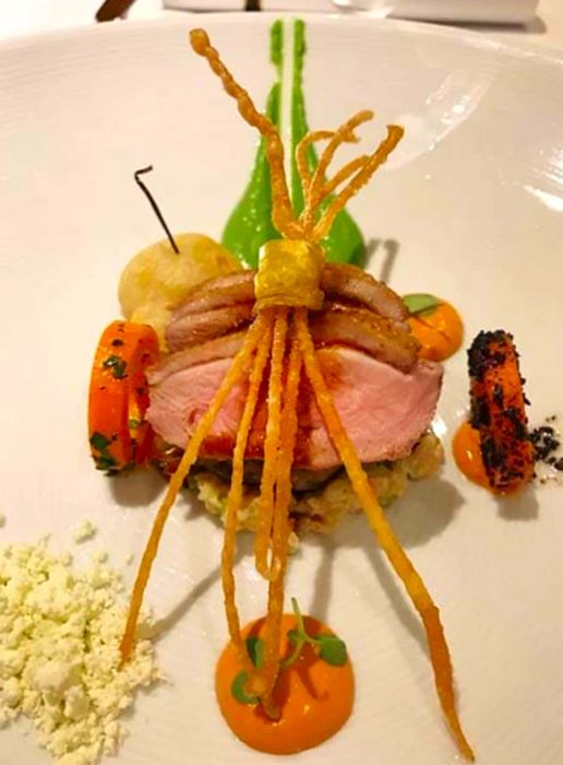 A specialty duck dish served on the Dinogo