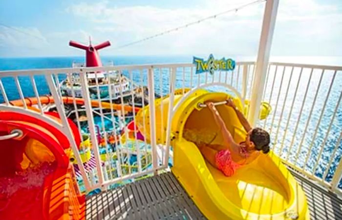 A person enjoying the thrill of the slide at WaterWorks