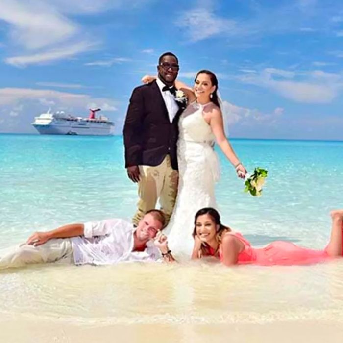 a couple celebrating their wedding on a beach