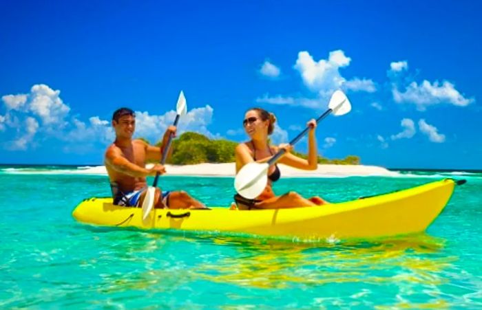 A couple kayaking in Hawaii on a spacious two-person kayak