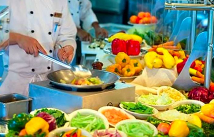 chef preparing a meal at the Mongolian wok