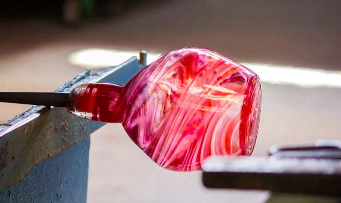 Italian artisans crafting beautiful glass