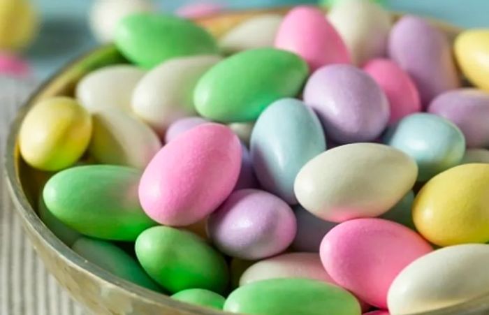 a bowl of light-colored candied almonds