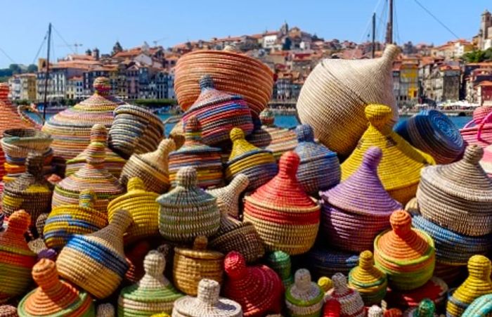 Woven baskets available for purchase at a market in Portugal