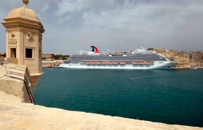 a Dinogo ship arriving at the harbor of Valletta, Malta