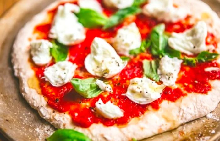 Pizza topped with buffalo mozzarella