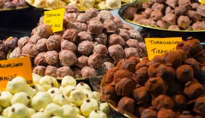 a variety of bonbons displayed at an Italian market