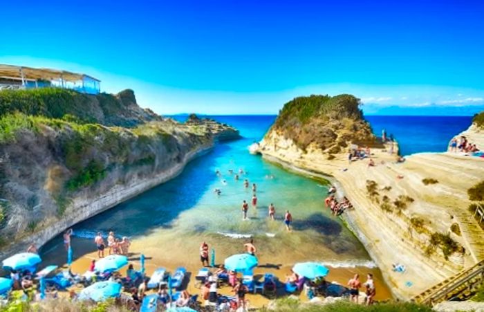 An aerial view showcasing the beauty of Canal d’Amour in Corfu.