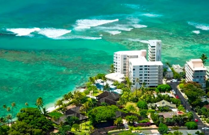 an aerial perspective of the coastline of Honolulu