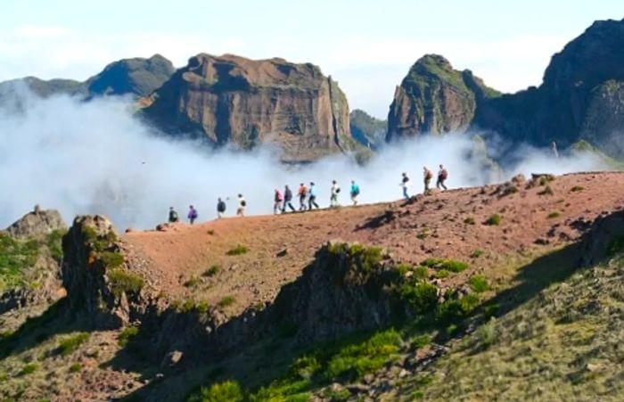 a group of hikers trekking through the Azores