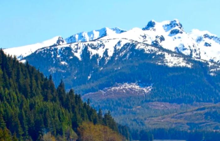 A view of the snow-capped mountain range from Icy Strait Point, Alaska