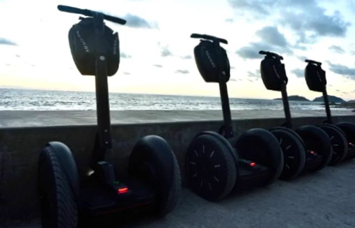 four segways lined up along the beach in Mazatlan, Mexico