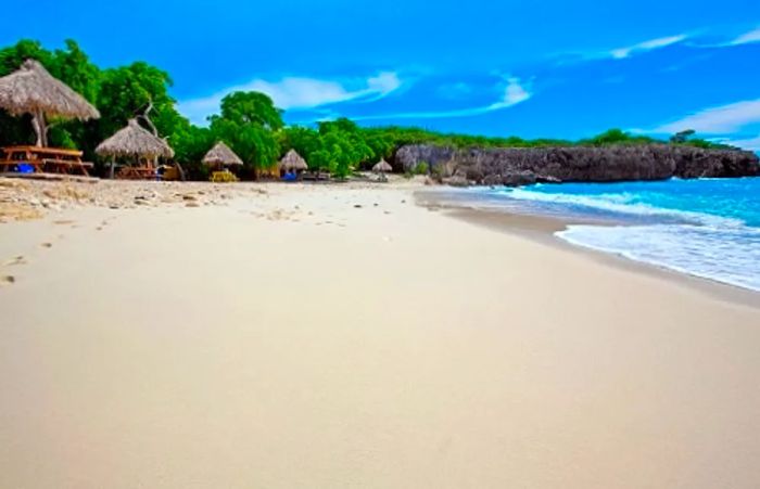 pristine white sands lining the beach in Curaçao