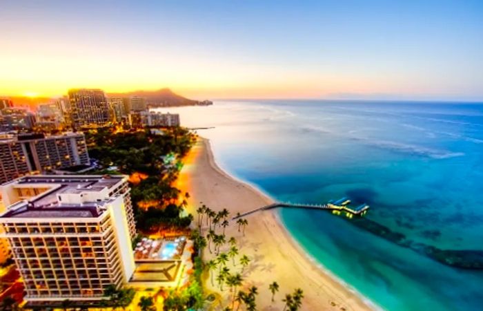 aerial view of sunrise over Waikiki Beach in Honolulu