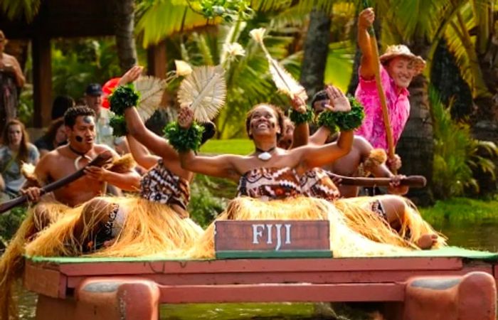 a group of dancers from Fiji showcasing their cultural heritage during the Polynesian Cultural Parade