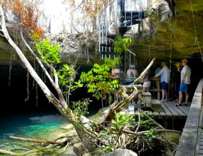 A group of people exploring a cave in The Bahamas