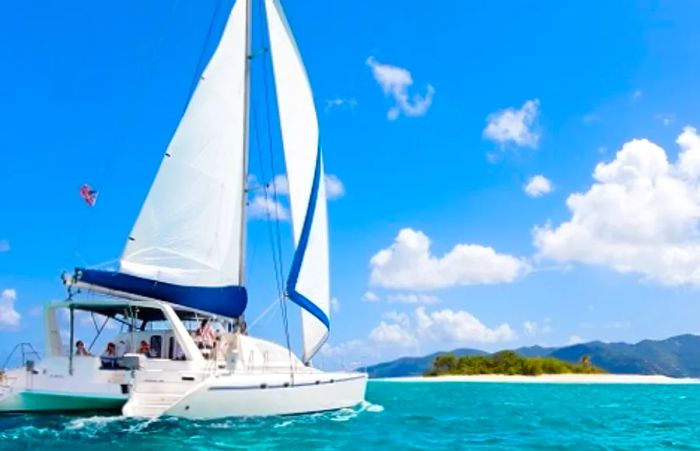 guests sailing on a catamaran off the coast of Freeport, Bahamas