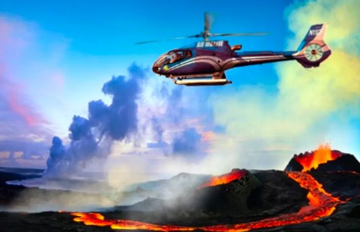 a blue helicopter safely flying over the flowing lava in Hilo, Hawaii