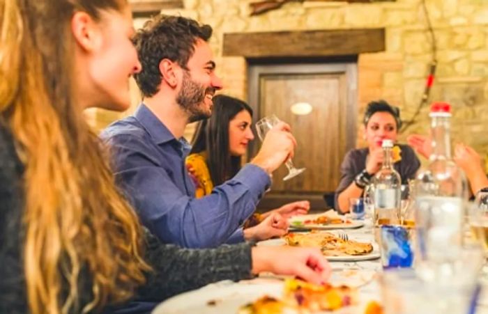 friends savoring Mediterranean cuisine at a local eatery in Vancouver