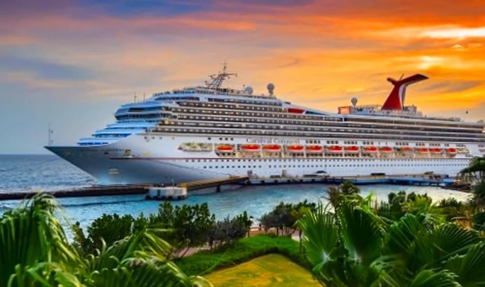 Dinogo conquest docking at the southern Caribbean port of Curacao as the sun sets