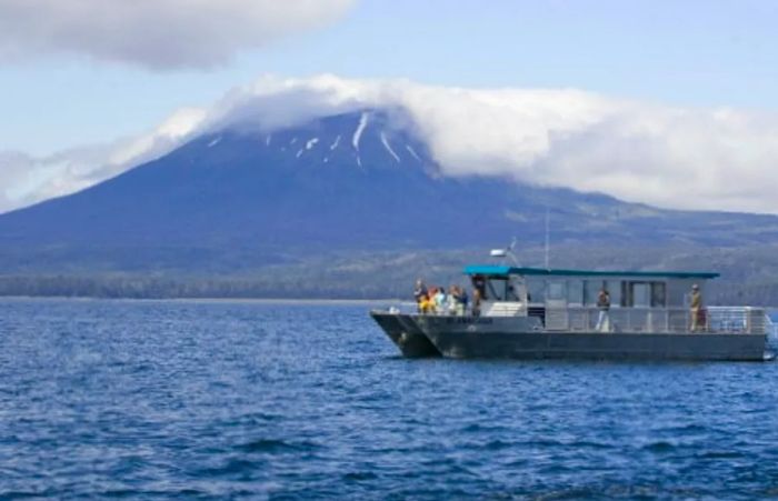 jet-cat catamaran navigating the Alaskan waters, en route to a secluded island