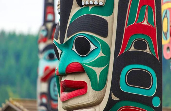 green, black, and red native Alaskan totem pole