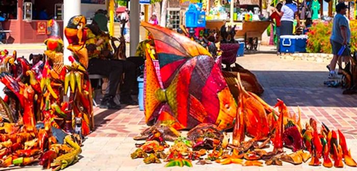 wood carvings of various sizes available for purchase in Montego Bay