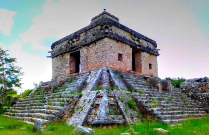 a ground view of the Temple of the Seven Dolls at Dzibilchaltun Mayan Ruins