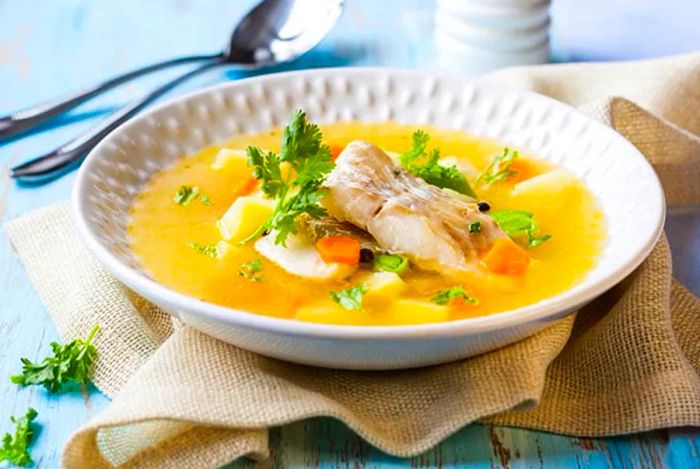 Sopi piska, a beloved fish soup from Bonaire, elegantly served in a white bowl