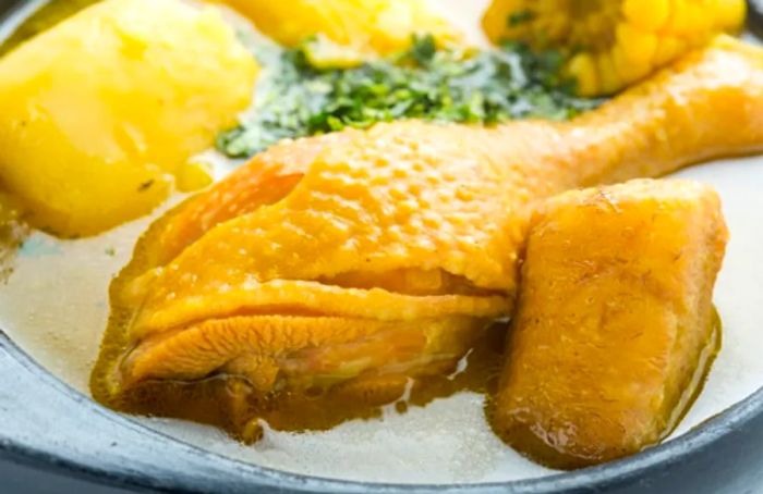 Dominican sancocho featuring chicken, potatoes, and plantains