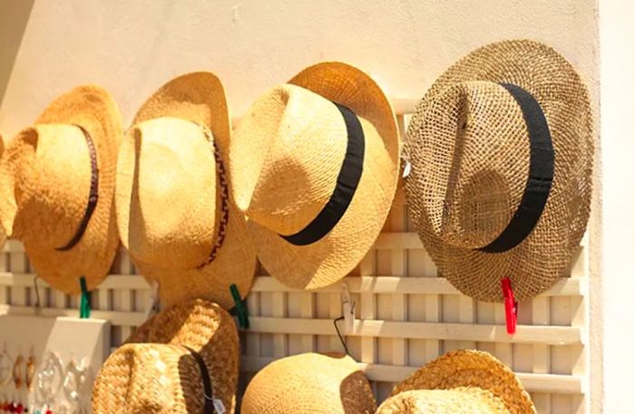 assortment of Jamaican straw hats available for purchase