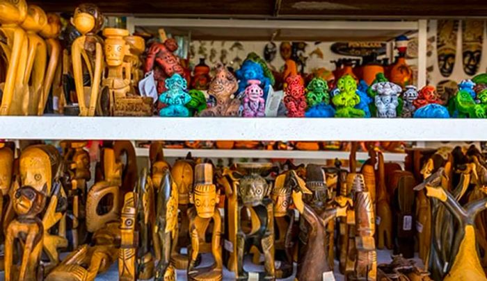 an assortment of wooden souvenirs available in La Romana