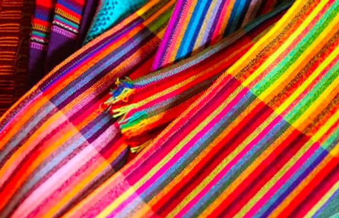 vibrant woven fabrics and garments