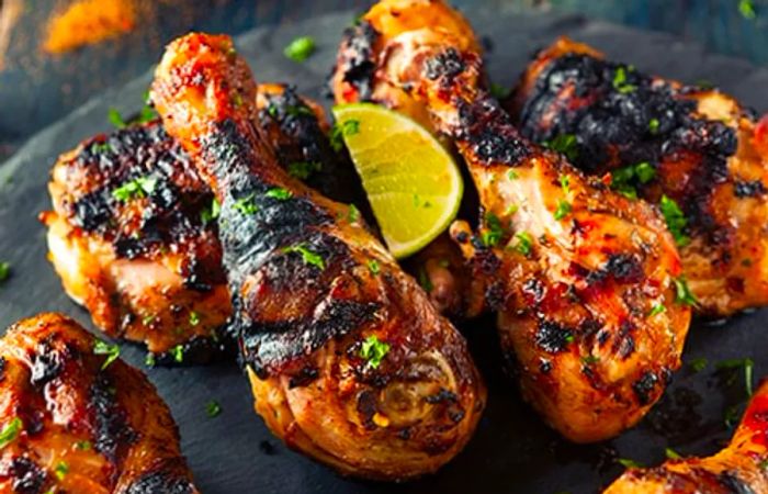 renowned Jamaican jerk spice rubs on grilled chicken