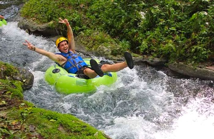 a man river tubing in ocho rios