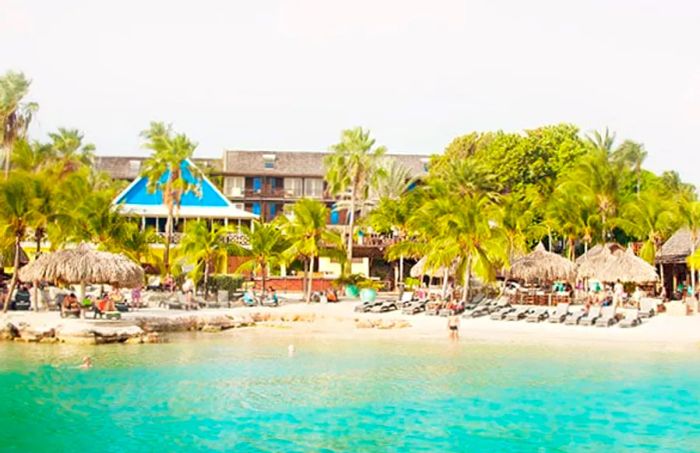 Crystal-clear blue waters and a sandy beach in Curacao