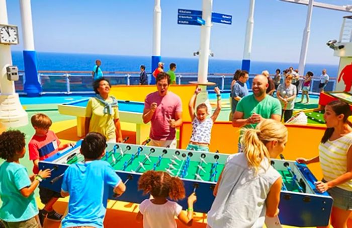 family and friends enjoying a foosball game at SportSquare