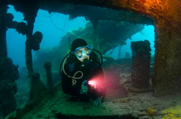 Scuba diving into a shipwreck in Barbados