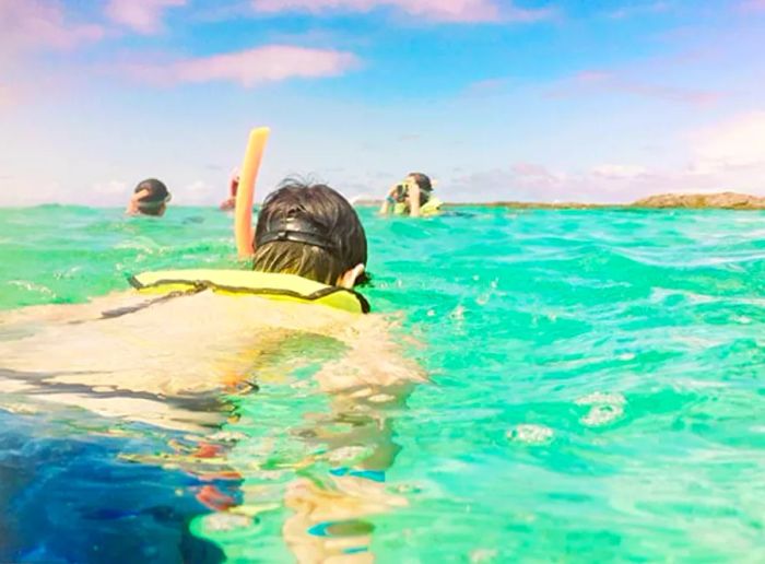 Randy enjoying a snorkeling experience in Grand Turk