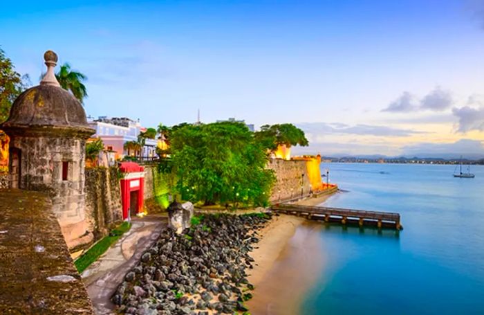 fortress walls along the San Juan coastline during sunset